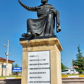 Statue of Hacı Bektaş Veli with some of his teachings on the column