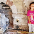 Beautiful Turkish girl posing by the Lion Fountain