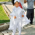 A little boy celebrating his circumcision