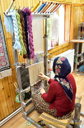 Handweaving silk carpets