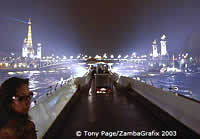 Bateaux-Mouches floodlights illuminate the banks of the Seine