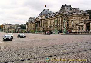 Tramlines across a cobblestoned Brussels square